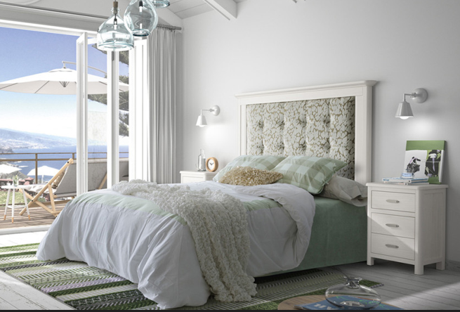 Dormitorio acogedor y elegante con paredes suaves, ropa de cama cómoda, y decoración minimalista que promueve la relajación y la inspiración personal.